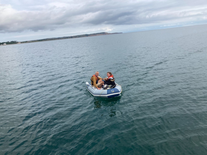 Mick transporting family ashore
